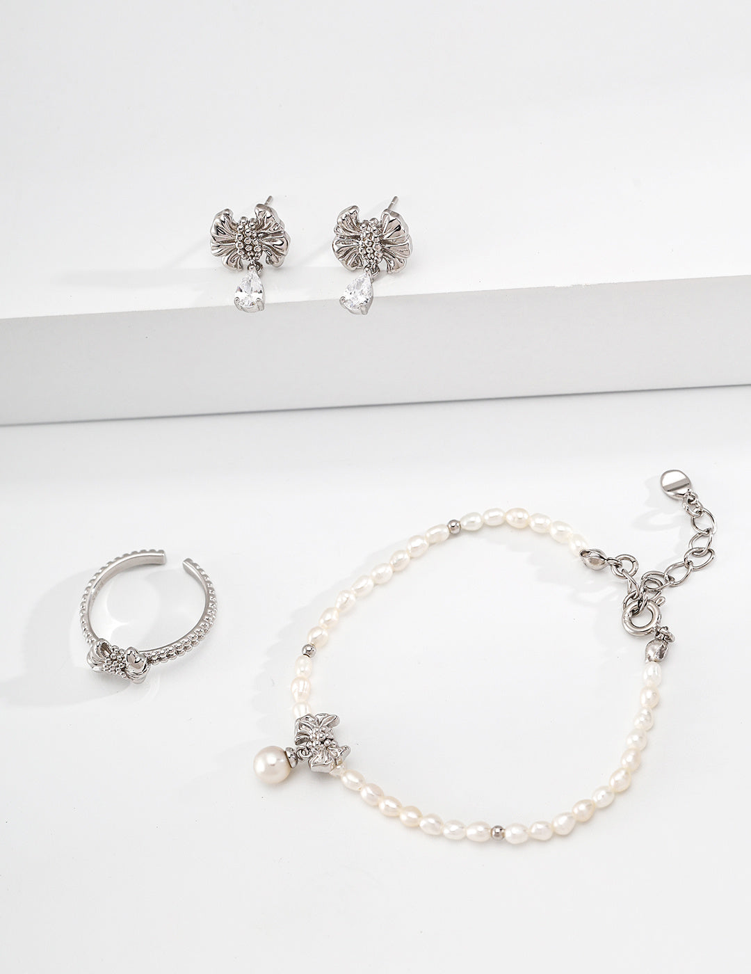 S925 金メッキ ニュアンスリボン リング ジルコニア 上品