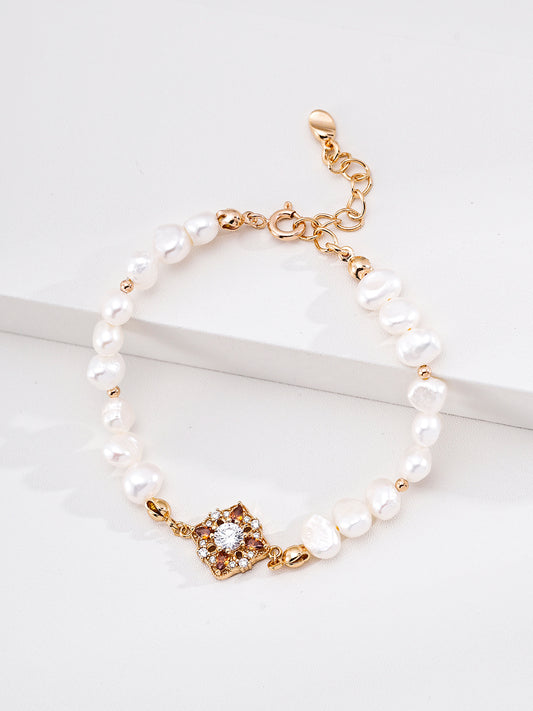 Hōsōge Motif Freshwater Pearl Red Zirconia Bracelet