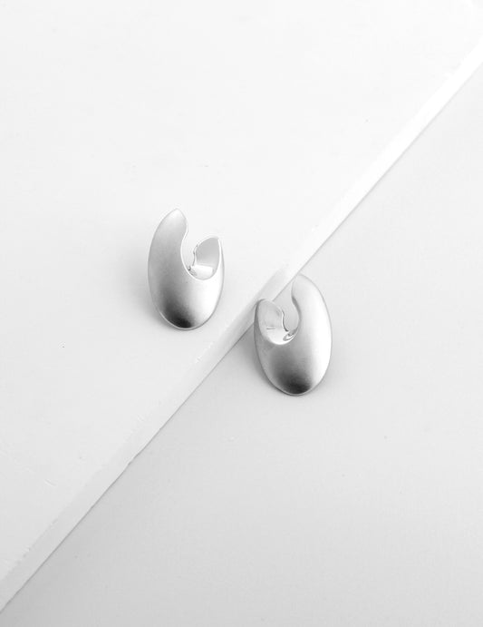 Silver 925 Geometric Oval Pierced Earrings with a Three-Dimensional Form