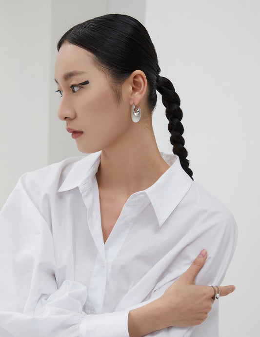 Silver 925 Geometric Oval Pierced Earrings with a Three-Dimensional Form
